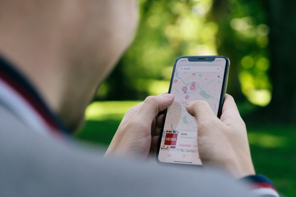 Person checking a map search result on a smartphone