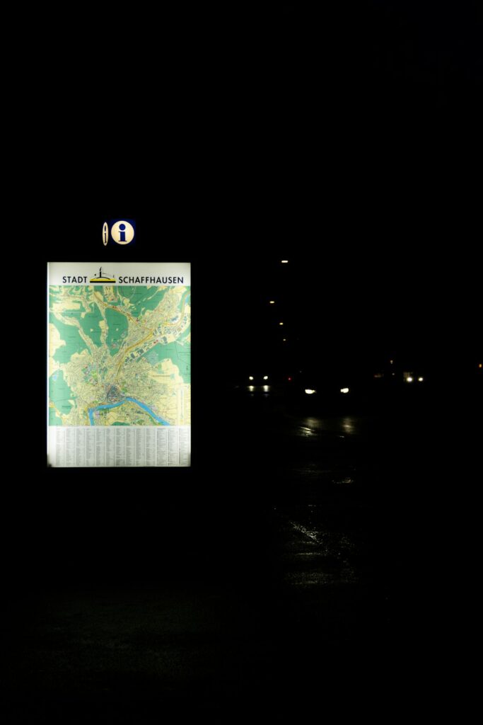 City street map sign at night