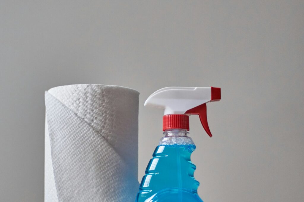 Cleaning spray bottle and cloth ready for a house cleaning job