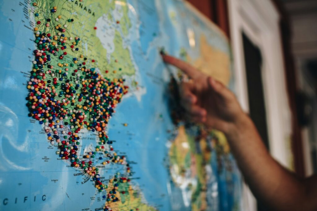 Two map pins marking duplicate business locations on a map, representing a duplicate Google Business listing