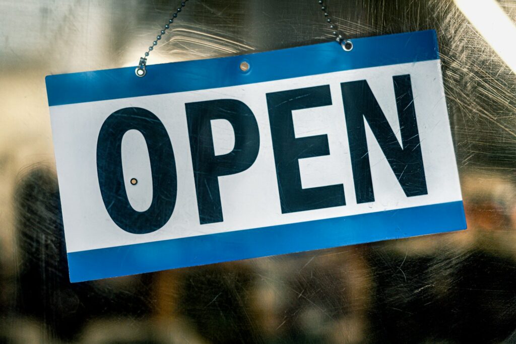 Open sign on a business door representing Google Business Profile attributes